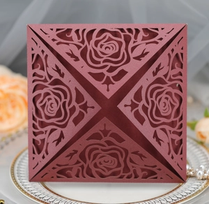 Detail view of laser-cut rose hollow invitation cover for wedding and festive occasions