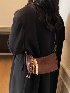 Brown frosted leather crescent shoulder bag with bohemian wooden beads for women