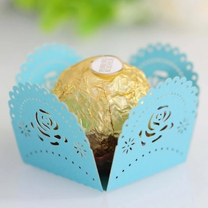Laser-cut sky blue paper candy wrapper featuring elegant rose patterns for party decor