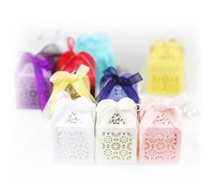 Laser cut floral candy boxes with satin ribbons for weddings and party favors
