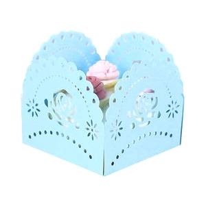 Detailed laser-cut light blue rose pattern hollow favor box with scalloped edges