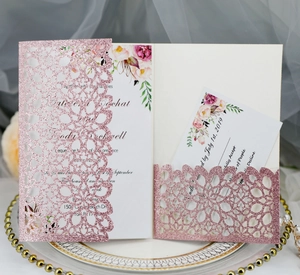 Pink glitter laser cut wedding invitation set with floral card and hollow envelope