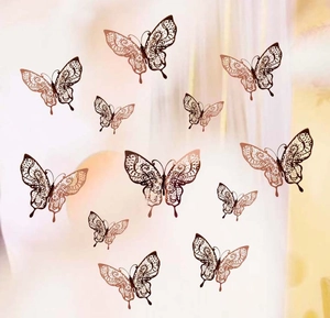 Set of 12 3D hollow butterfly wall stickers in rose gold metal with floral patterns