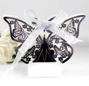 Laser cut butterfly wedding candy box in dark violet with a silver ribbon and base