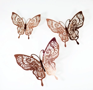 Three rose gold hollow lace butterfly wall stickers with 3D wings for home decor