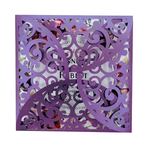 Elegant purple laser-cut wedding invitation with hollow floral design and pearl paper cover