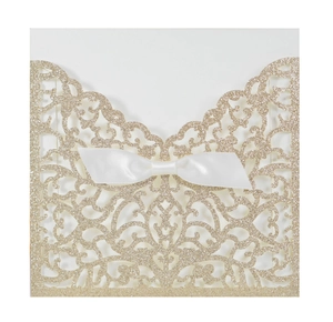 Partecipazione di nozze laser cut glitter oro champagne con fiocco in raso bianco