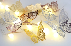 Golden and silver metal hollow butterfly LED string lights for warm home decoration