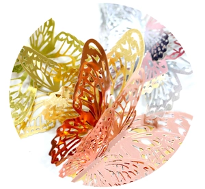 Close-up of 3D hollow butterfly wall stickers with metallic gold paper texture