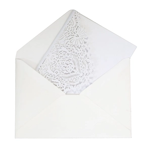 Detail view of laser-cut floral art cards and white V-flap envelopes on a white background
