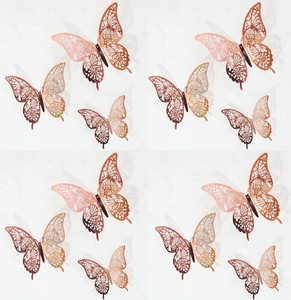 Detail of 3D hollow butterfly wall stickers in rose gold with intricate laser-cut patterns