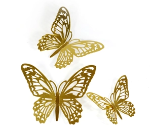 Detailed view of three gold hollowed-out 3D butterfly wall stickers in varying sizes