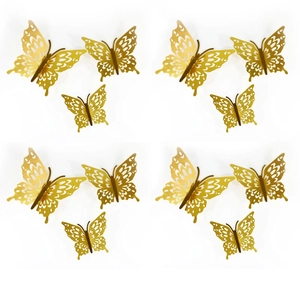 Detailed view of golden 3D hollow paper butterflies in assorted sizes for wall decor