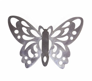 Detailed macro view of silver hollow butterfly wall sticker with intricate cutout patterns