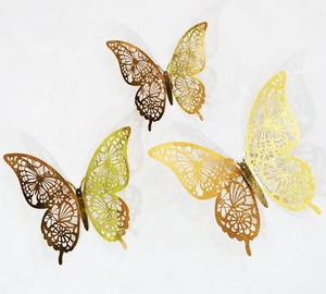 Detailed laser-cut hollow 3D butterfly wall decor with metallic gold and green finish