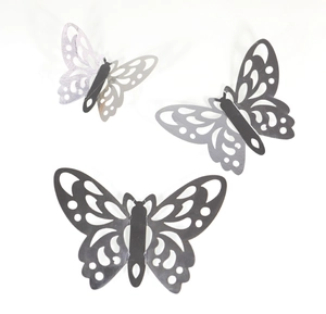 Three sizes of metallic hollow butterfly wall stickers with detailed 3D folding wings