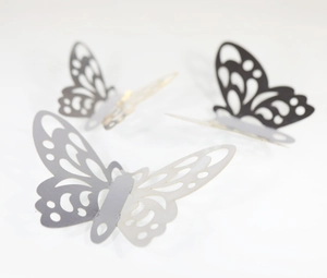 Detail of 3D hollow butterfly wall stickers in black, grey and silver metallic finishes