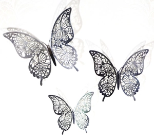 Set of three silver hollow 3D butterfly wall stickers in varying sizes for home decor