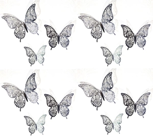 Detail of 3D hollow paper butterfly wall stickers with silver floral heart patterns
