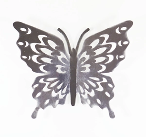 Detail of mirror gold hollow butterfly wall sticker with intricate cutout pattern design