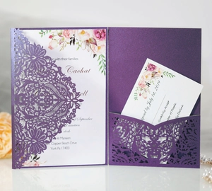 Detail of laser-cut purple mandala wedding invitation set with floral inner card