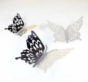 Detail of mirror gold and silver 3D hollow butterfly wall stickers for wedding party decor