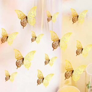 Set of 12 golden 3D hollow butterfly wall stickers with intricate laser-cut patterns