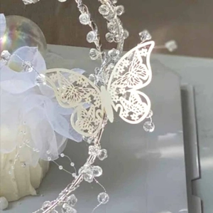 Stickers muraux papillons 3D ajourés ivoire avec perles de cristal pour déco de fête