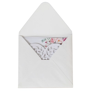 Elegant laser-cut hollow heart wedding invitation with white envelope and pink floral card