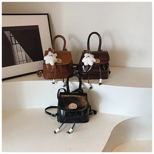 Detailed display of mini retro leather backpacks in black, coffee and brown colors