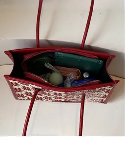 Top view of red Double Happiness tote bag with spacious interior for tablet and wallet
