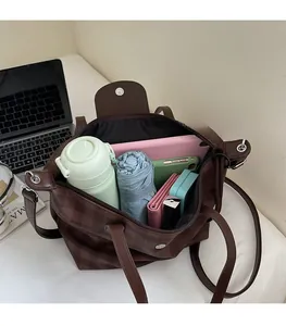 Top view of coffee plaid tote bag interior showing large capacity for laptop and umbrella