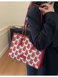 Elegant red wedding tote bag with traditional pattern and leather straps for women