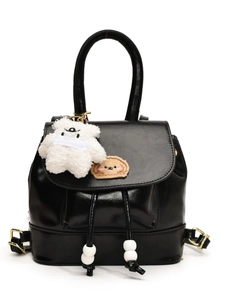 Vintage black mini bucket backpack in shiny leather with bear charm and embroidery