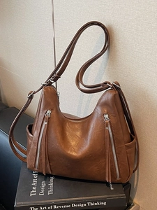 Retro brown soft leather hobo bag with tassel zippers and adjustable shoulder strap