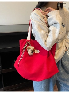 Red oversized canvas tote bag with pleated texture and cute puppy charm for women