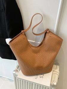 Brown woven texture tote bag with shoulder strap for daily commuting and fashion