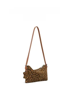Detail of vintage leopard print underarm bag featuring suede texture and leather strap