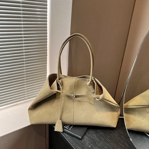 Detail view of khaki matte textured tote bag with large capacity and soft shoulder strap