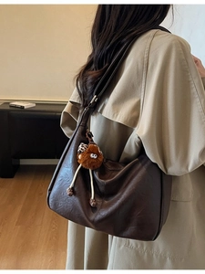 Deep brown large hobo shoulder bag with fuzzy eye charm for women autumn style