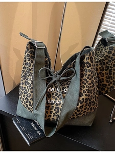 Leopard print denim tote bag with army green canvas strap and sweet bow decoration