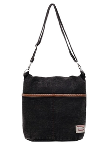 Large black denim tote bag with brown leather accents and adjustable shoulder strap