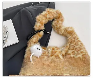 Detail of plush leopard print tote bag with comfortable fuzzy shoulder strap