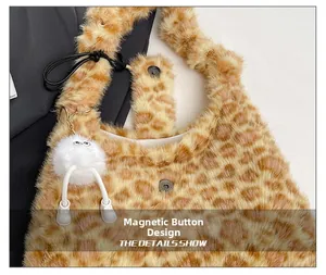 Detail view of the plush leopard print tote bag featuring a secure magnetic closure