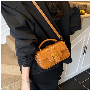 Brown wrinkled patent leather small square bag with gold buckle and top handle detail