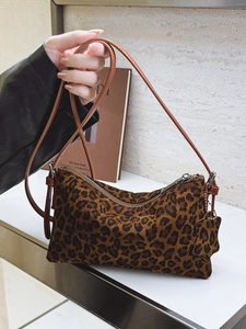 Minimalist leopard print shoulder bag with suede texture and brown leather strap