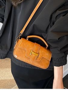Vintage brown crocodile embossed handbag with gold H-buckle and detachable shoulder strap