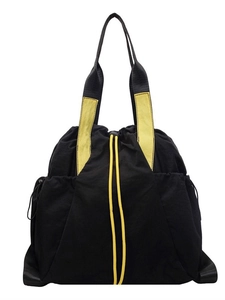 Black canvas tote bag with yellow drawstring and double handles for daily commuting