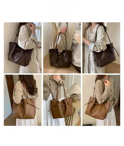 Detail of soft lychee texture faux leather tote bags with drawstring side knots