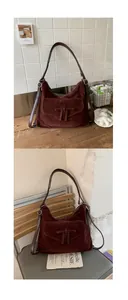 Detail of burgundy suede tote bag showing soft matte texture and front tie-up pocket design